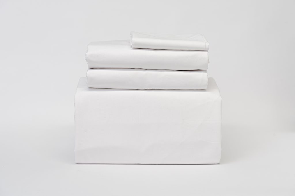 White hotel sheets with smooth crisp finish for hotels and accommodation