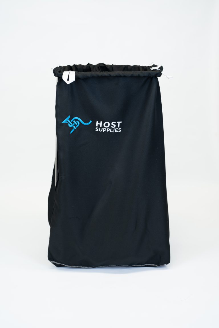 Heavy-duty nylon commercial laundry bag with drawstring closure for hospitality