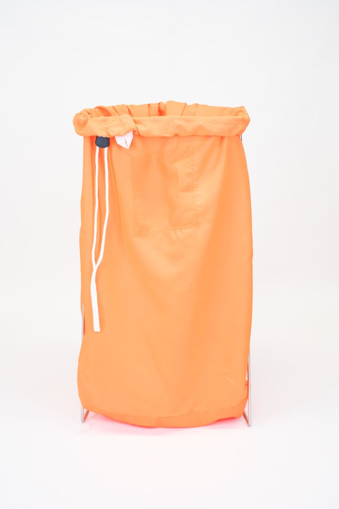 Heavy-duty nylon commercial laundry bag with drawstring closure for hospitality