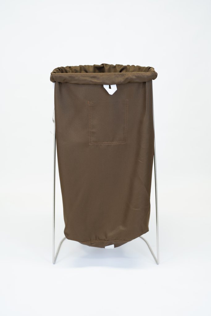 Heavy-duty nylon commercial laundry bag with drawstring closure for hospitality