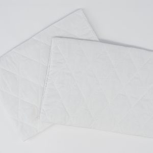 Quilted pillow protector with zipper for hotels and accommodation