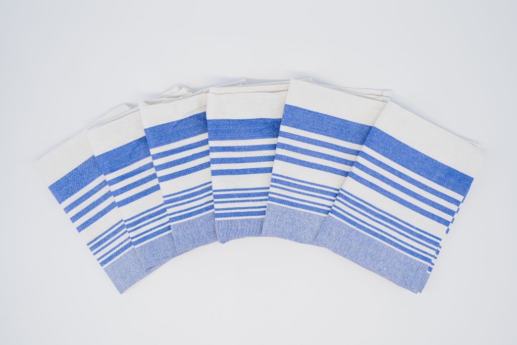 Blue and white striped commercial tea towel for hospitality and kitchens