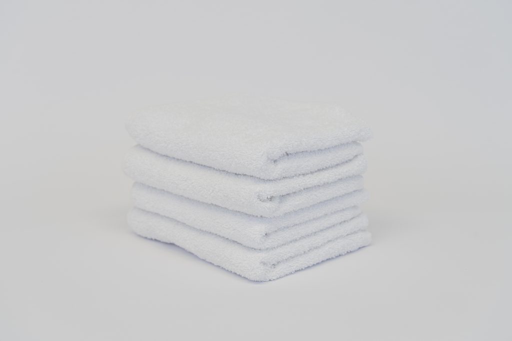 Plush commercial white towel for hotels and guest rooms