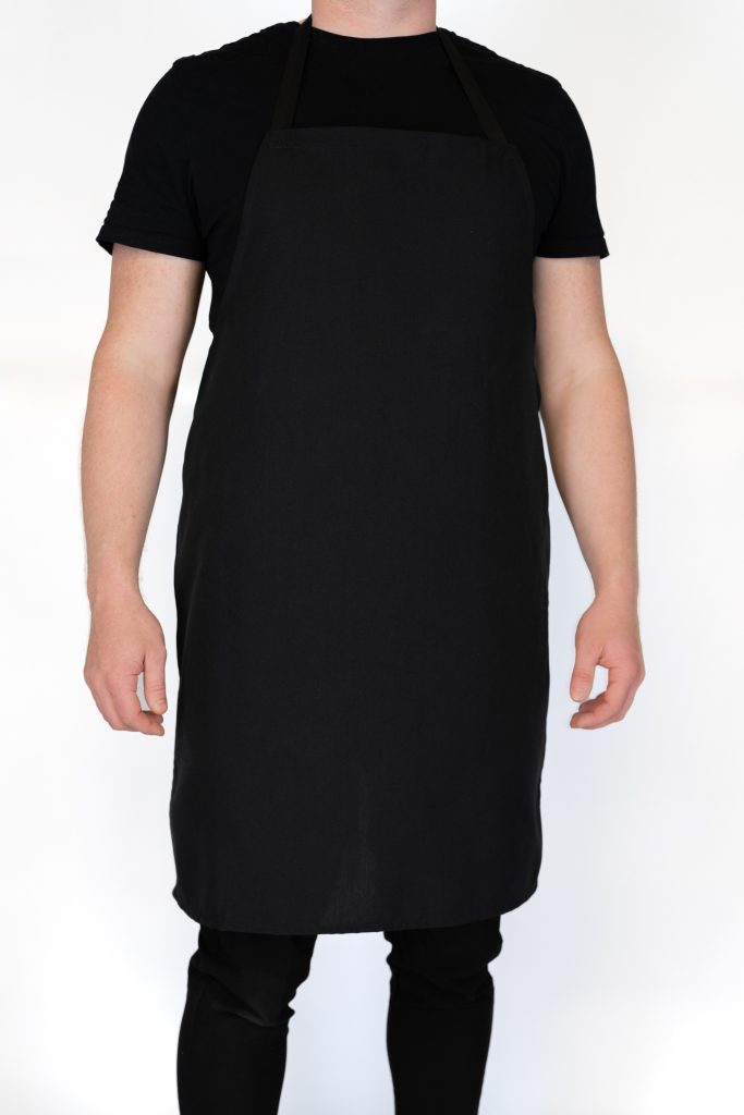Classic black apron for chefs, hospitality, and kitchen staff