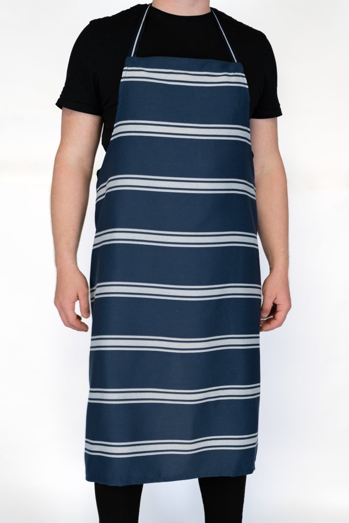 Heavy-duty butcher apron for meat processing and commercial kitchens