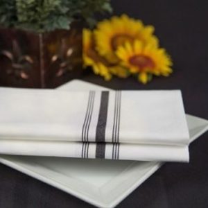 White bistro napkin with black stripe for restaurants and cafes